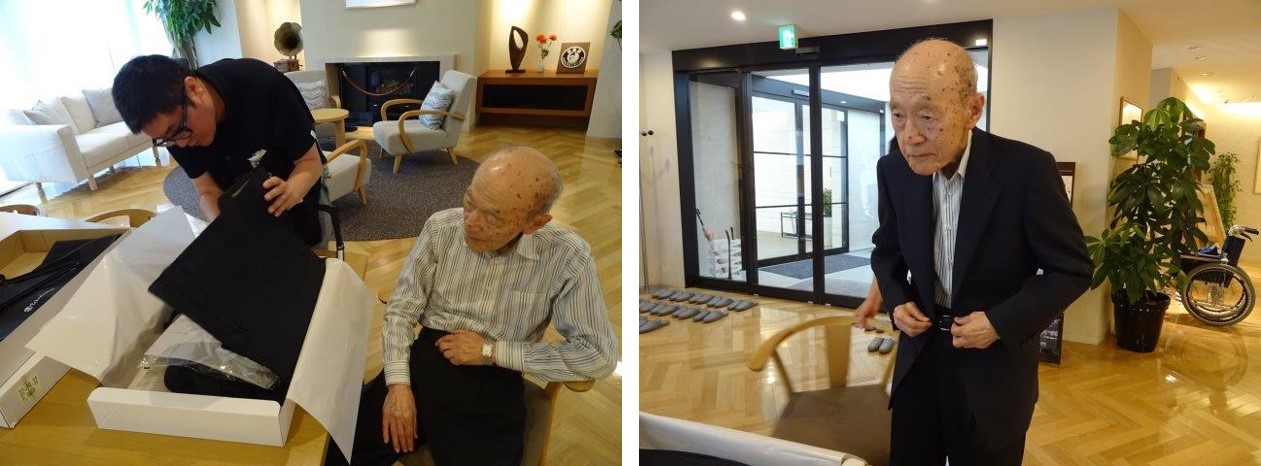 男性が仕立てたスーツを着ている様子